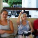 Three students at a table in a cafe